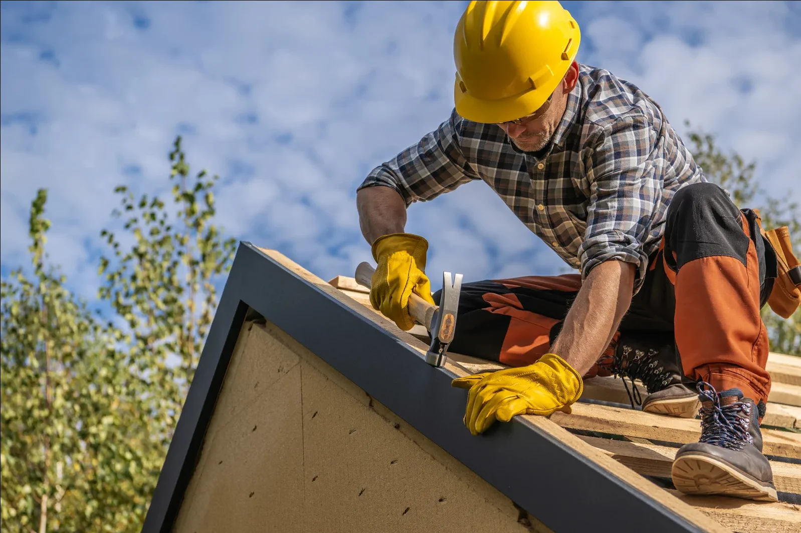 Licensed contractor working on a California rooftop job site